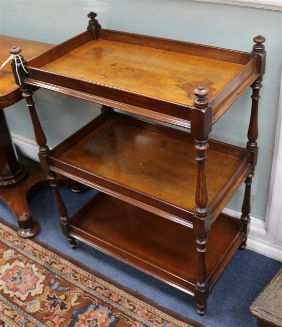 A mahogany three tier etagere, on turned and square supports and legs, W.66cm